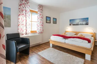 Ein Bett oder Betten in einem Zimmer der Unterkunft Ferienpark Freesenbruch Wohnung 3 1 - Schöne Auszeit