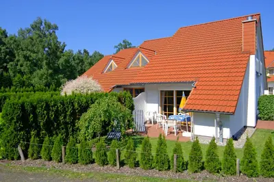Ein Garten an der Unterkunft Ferienpark Freesenbruch Reihenhaus 8 - Zum Meer