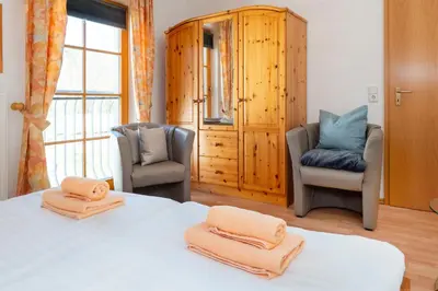 Ein Bett oder Betten in einem Zimmer der Unterkunft Ferienpark Freesenbruch Reihenhaus 7b - Meerzeit