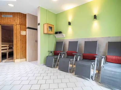 Ein Sitzbereich in der Unterkunft Ferienpark Freesenbruch Reihenhaus 7b - Meerzeit