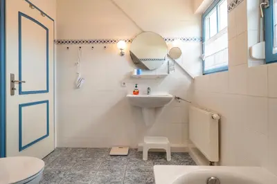 Ein Badezimmer in der Unterkunft Ferienpark Freesenbruch Doppelhaushälfte 11a - Schwalbennest