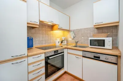 Küche/Küchenzeile in der Unterkunft Ferienpark Freesenbruch Wohnung 3 5 - Muschelsucher