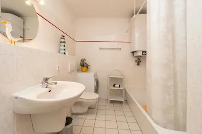 Ein Badezimmer in der Unterkunft Ferienpark Freesenbruch Wohnung 2 5 - Auszeit