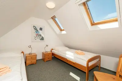Ein Bett oder Betten in einem Zimmer der Unterkunft Ferienpark Freesenbruch Wohnung 2 5 - Auszeit