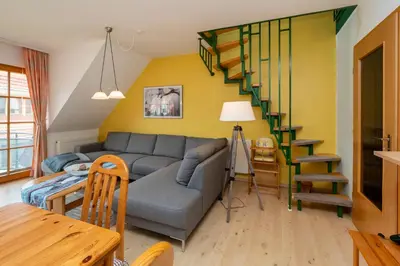 Ein Sitzbereich in der Unterkunft Ferienpark Freesenbruch Wohnung 1 5 - Amber