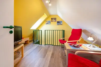 Ein Sitzbereich in der Unterkunft Ferienpark Freesenbruch Wohnung 1 5 - Amber