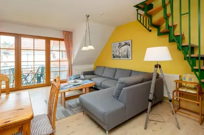 Ein Sitzbereich in der Unterkunft Ferienpark Freesenbruch Wohnung 1 5 - Amber