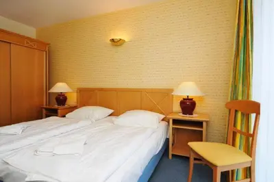 Ein Bett oder Betten in einem Zimmer der Unterkunft Appartmenthaus Meerlust Wohnung M 309