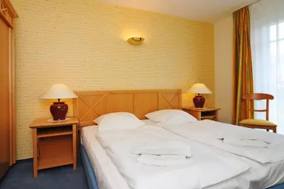 Ein Bett oder Betten in einem Zimmer der Unterkunft Appartmenthaus Meerlust Wohnung M 309