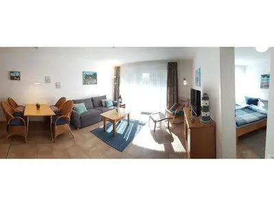 Ein Sitzbereich in der Unterkunft Residenz am Strand Dünentraum - Wohnung 1-05