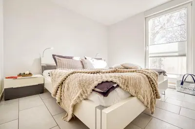 Ein Bett oder Betten in einem Zimmer der Unterkunft Hafenstrasse 15 Ephelia in Prerow