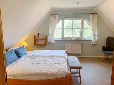 Ein Bett oder Betten in einem Zimmer der Unterkunft Strandhaus Pilgrim
