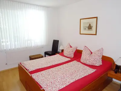 Ein Bett oder Betten in einem Zimmer der Unterkunft Ferienwohnung Sobek