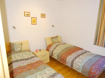 Ein Bett oder Betten in einem Zimmer der Unterkunft Ferienwohnung Sobek