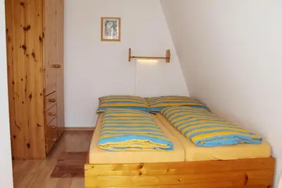 Ein Bett oder Betten in einem Zimmer der Unterkunft Hafenstrasse 34 - Wohnung 3
