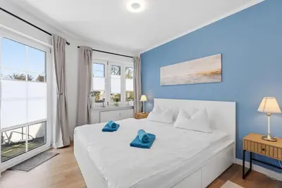 Ein Bett oder Betten in einem Zimmer der Unterkunft Hafenstrasse 34 - Wohnung 5