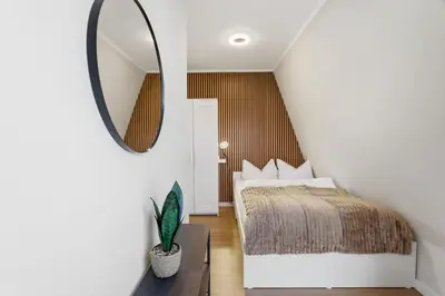Ein Bett oder Betten in einem Zimmer der Unterkunft Hafenstrasse 34 - Wohnung 5