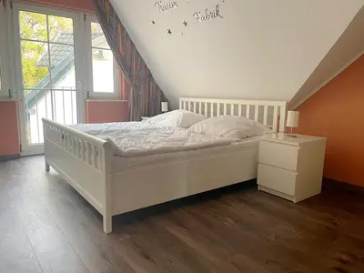 Ein Bett oder Betten in einem Zimmer der Unterkunft Hafenstrasse 34 - Wohnung 8