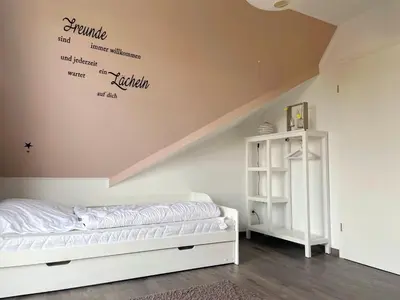 Ein Bett oder Betten in einem Zimmer der Unterkunft Hafenstrasse 34 - Wohnung 8