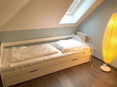 Ein Bett oder Betten in einem Zimmer der Unterkunft Hafenstrasse 34 - Wohnung 8