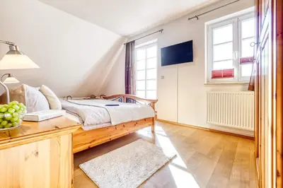 Ein Bett oder Betten in einem Zimmer der Unterkunft Haus Leni