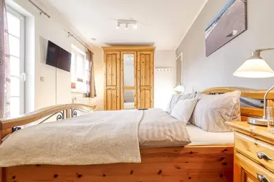 Ein Bett oder Betten in einem Zimmer der Unterkunft Haus Leni