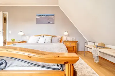 Ein Bett oder Betten in einem Zimmer der Unterkunft Haus Leni
