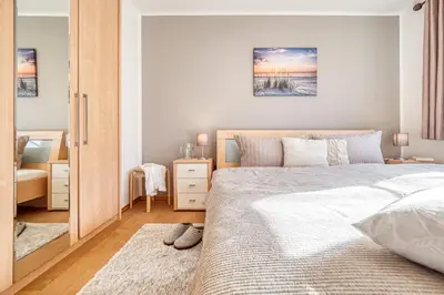 Ein Bett oder Betten in einem Zimmer der Unterkunft Haus Leni
