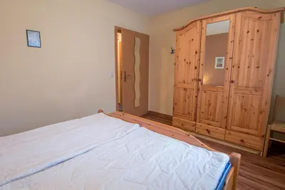 Ein Bett oder Betten in einem Zimmer der Unterkunft Hoppenberg 9 EG links