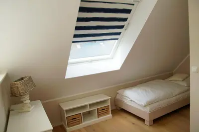 Ein Bett oder Betten in einem Zimmer der Unterkunft Doppelhaushälfte - Isabella