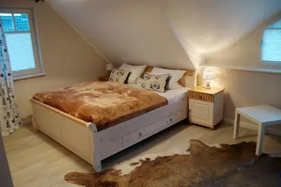 Ein Bett oder Betten in einem Zimmer der Unterkunft Doppelhaushälfte - Isabella