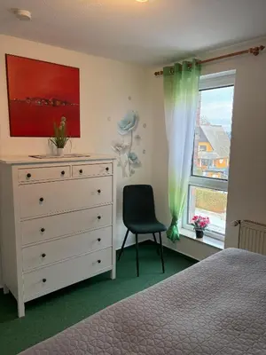 Ein Bett oder Betten in einem Zimmer der Unterkunft Ferienwohnung Jonathan