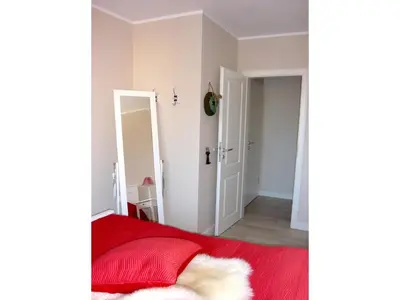 Ein Bett oder Betten in einem Zimmer der Unterkunft Neue Reihe 28 - Wohnung Kleine Auszeit