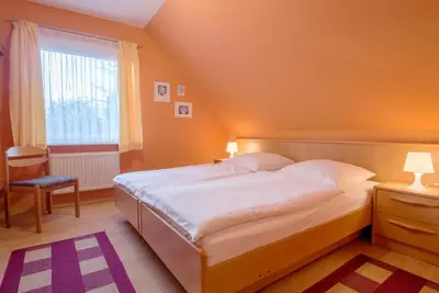 Ein Bett oder Betten in einem Zimmer der Unterkunft Zur Hanse Wohnung 1 3 - Lingnau