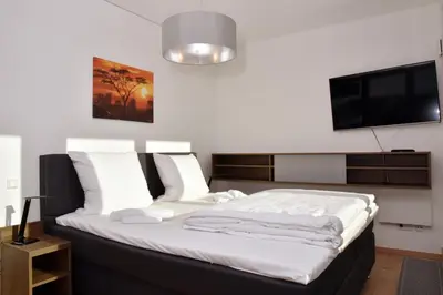 Ein Bett oder Betten in einem Zimmer der Unterkunft Logierhaus Friedrich WE 22 - 