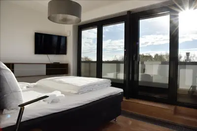 Ein Bett oder Betten in einem Zimmer der Unterkunft Logierhaus Friedrich WE 22 - 