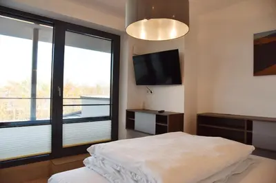 Ein Bett oder Betten in einem Zimmer der Unterkunft Logierhaus Friedrich WE 23 - 