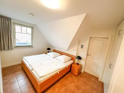 Ein Bett oder Betten in einem Zimmer der Unterkunft Mühlenstrasse 19 - Wohnung 4