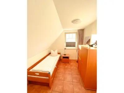 Ein Bett oder Betten in einem Zimmer der Unterkunft Mühlenstrasse 19 - Wohnung 4
