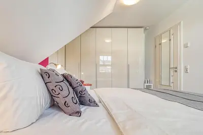 Ein Bett oder Betten in einem Zimmer der Unterkunft Mühlenstrasse 23 - Wohnung Boddenstern