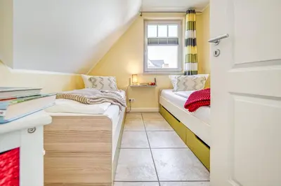 Ein Bett oder Betten in einem Zimmer der Unterkunft Mühlenstrasse 23 - Wohnung Boddenstern