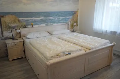 Ein Bett oder Betten in einem Zimmer der Unterkunft Nautilus
