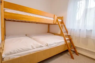 Ein Bett oder Betten in einem Zimmer der Unterkunft Nautilus
