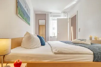 Ein Bett oder Betten in einem Zimmer der Unterkunft Residenz am Strand Backfisch - Wohnung 5-66