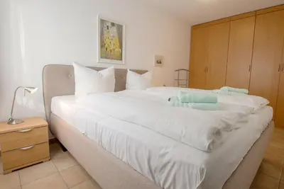 Ein Bett oder Betten in einem Zimmer der Unterkunft Residenz am Strand Ostseeglück - Wohnung 1-13