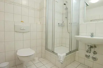 Ein Badezimmer in der Unterkunft Residenz am Strand Ostseeglück - Wohnung 1-13