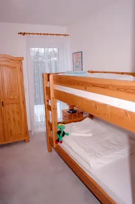 Ein Bett oder Betten in einem Zimmer der Unterkunft Parkresidenz am Hafen Wohnung HF 31