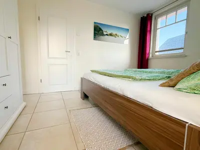 Ein Bett oder Betten in einem Zimmer der Unterkunft Kavelweg 9 Whg 4 - Pier 12