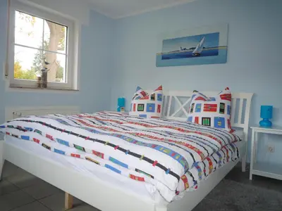 Ein Bett oder Betten in einem Zimmer der Unterkunft Rämel 38 - Wohnung 17