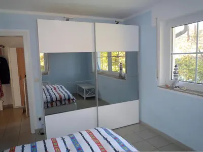 Ein Bett oder Betten in einem Zimmer der Unterkunft Rämel 38 - Wohnung 17